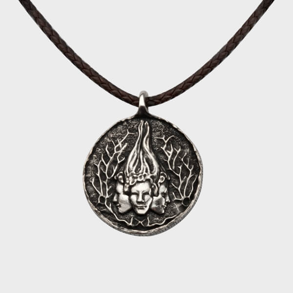 A bespoke Wiccan Goddess pendant in silver on leather.